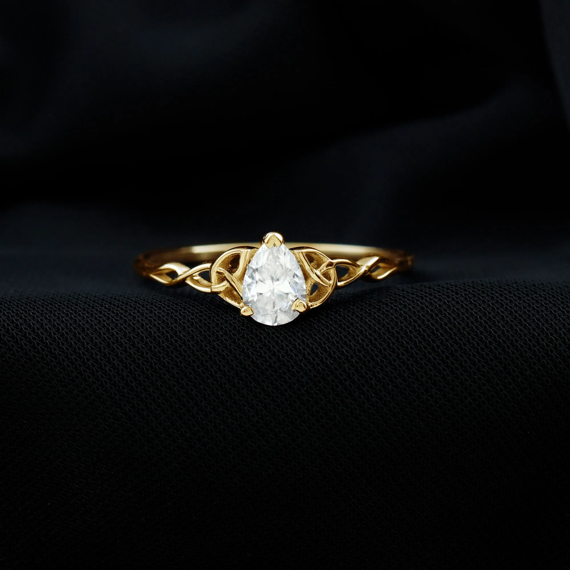 5X7 MM Pear Cut Moissanite Solitaire Ring with Celtic Detailing